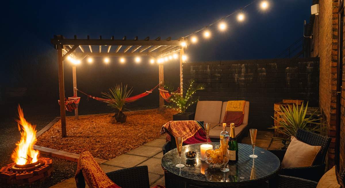 Enjoy magical fireside moments under the starry skies. Jump into the bubbly hot tub in the moonlight. 