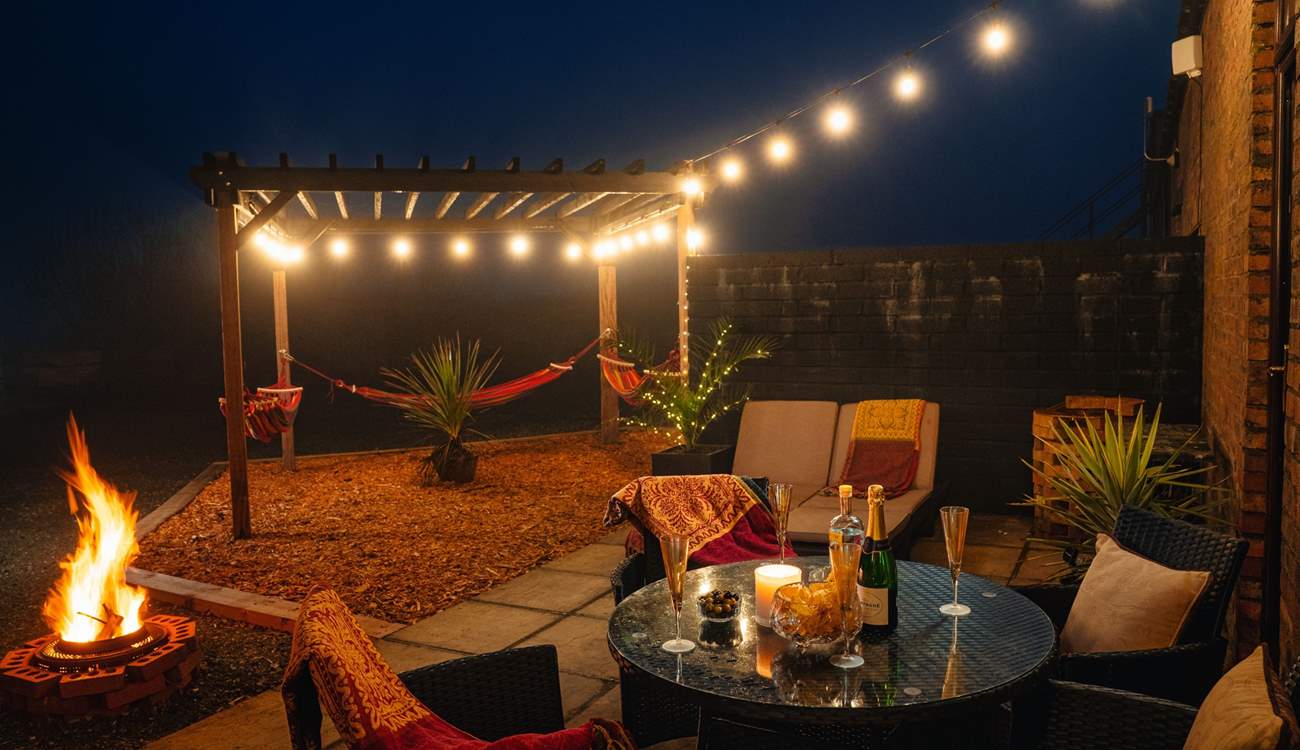 Enjoy magical fireside moments under the starry skies. Jump into the bubbly hot tub in the moonlight. 