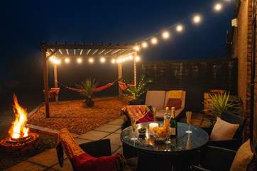 Enjoy magical fireside moments under the starry skies. Jump into the bubbly hot tub in the moonlight.