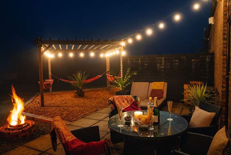 Enjoy magical fireside moments under the starry skies. Jump into the bubbly hot tub in the moonlight. 