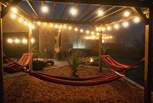 Relax in the hammocks with your favourite book.