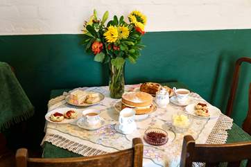 Pop 1940s music on the Bluetooth speaker and enjoy a cream tea.