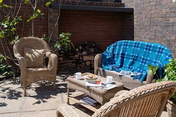 Relax on the sunny patio with a good book and not a care in the world.