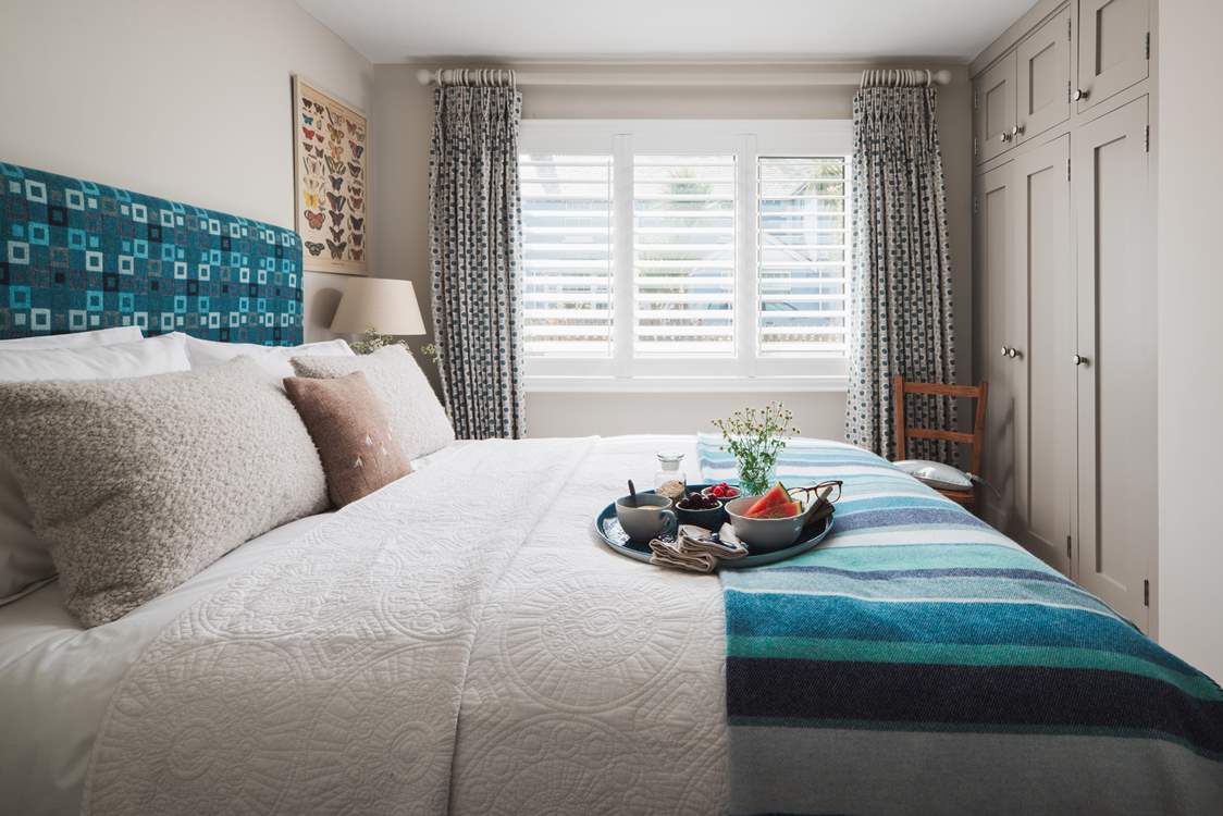 In bedroom 1, a super comfy king-size bed awaits.