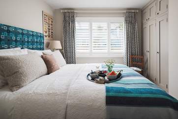 In bedroom 1, a super comfy king-size bed awaits.