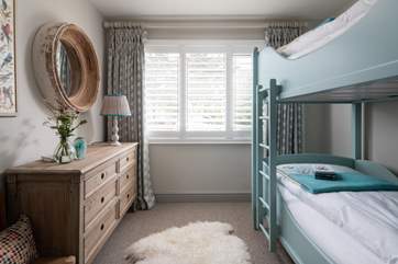 Even the bunk-room has had the full style treatment - what a treat for the younger members of your party.