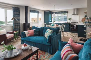 The open plan living-room is quite simply gorgeous and a wonderful room for all to gather.