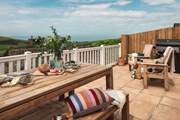 The terrace beckons you outside, to enjoy outdoor dining at its very best or the place to chill with a good book and your favourite sundowner.