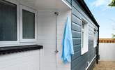 Bossiney Cabin even has an outdoor shower, [perfect for rinsing off after a day at the beach- there also secure storage for surfboards and bicycles - Thumbnail Image