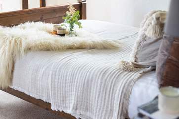 Lovely bed linens ensure a great night's sleep.