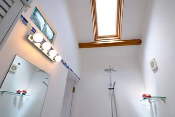 The Velux window gives additional natural light to the wet-room.