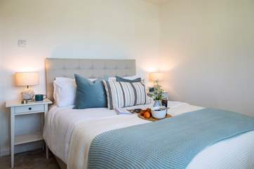 Another beautiful bedroom and a bed that's dressed to impress in the third bedroom.