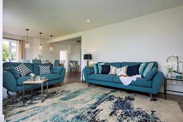 The open plan living-room is a wonderful room for all to gather.