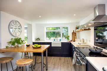 The stylish kitchen is wonderfully light and airy.