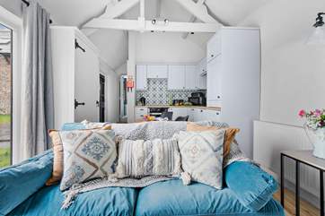 The comfy sofa invites you to relax.