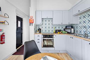 The gorgeous kitchen has all you need.