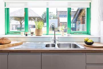 Everything you will need is close at hand in the lovely kitchen.