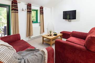 The comfy sitting-area is ideal for relaxing after a busy day out and about exploring.
