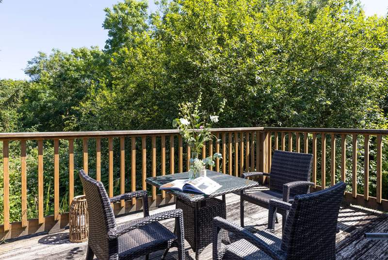 Delightful Warner Cottage has a fabulous deck where you can sit in the sun and listen to birdsong.