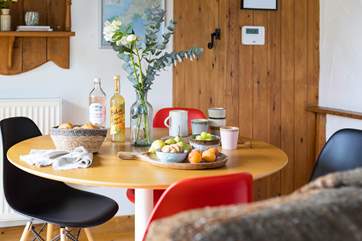 Gather the family around the table to discuss the plan for the day ahead.
