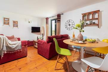 The open plan living space is perfect for a family or group of friends.