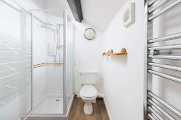 Bedroom 2 has an en suite shower-room for a refreshing shower after a day out and about.