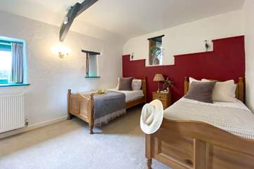 One of two spacious twin bedrooms, perfect for children or adults.