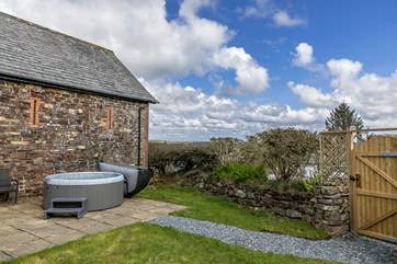 Relax in your very own hot tub at Duchy Cottage.