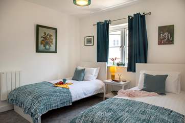The twin bedroom is great for both children and adults alike.