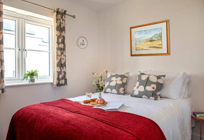 A lovely double bed awaits you in bedroom 2.