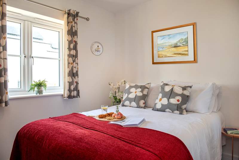A lovely double bed awaits you in bedroom 2.