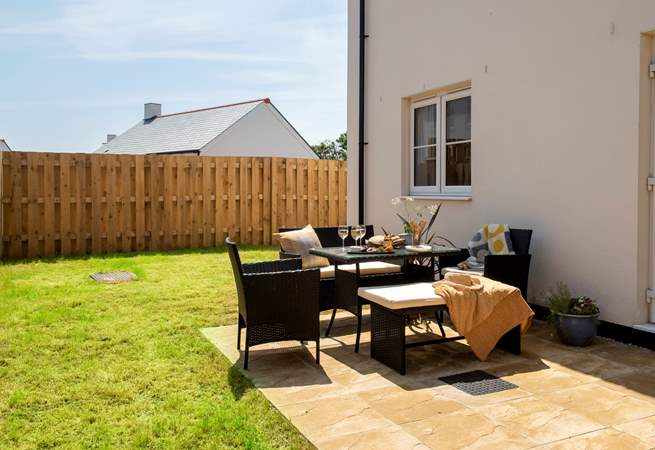 An enclosed sunny garden and terrace to enjoy outside dining.