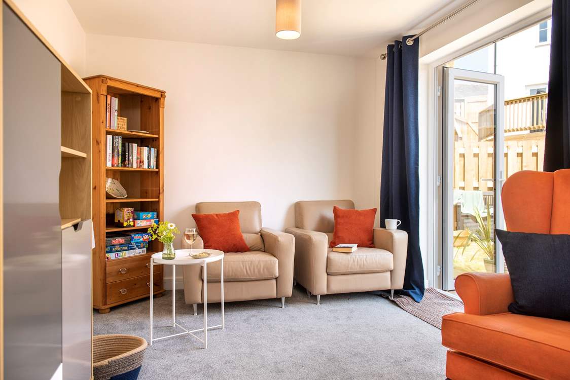 From the sitting-room, patio doors lead you out to the garden.