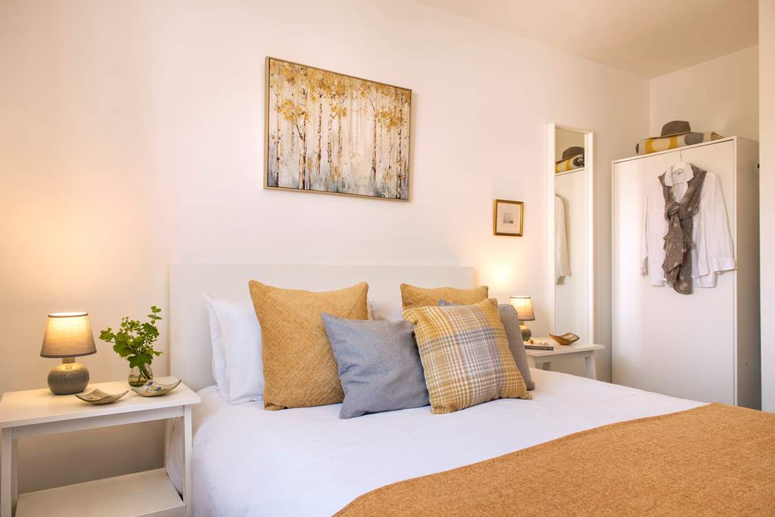 Pretty bedroom 1 has a comfy king-size bed.