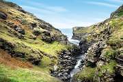 Head out along the coastal footpath through Rocky Valley and on to the harbourside village of Boscastle.