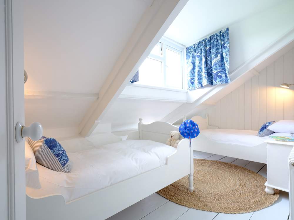 The children will be super excited to sleep in such a cute bedroom.
Please note due to the characterful sloping ceilings there is limited headroom.