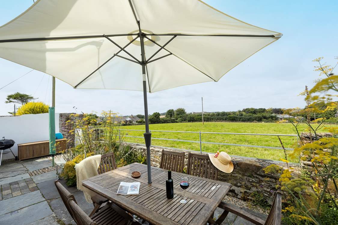 Enjoy the views over the field from the back garden.