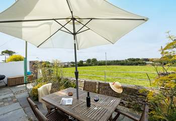 Enjoy the views over the field from the back garden.