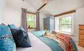 Dual-aspect, the bedroom is light and airy. - Thumbnail Image