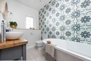 The en suite bathroom is stunning.