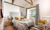 Moss Farmhouse has five gorgeous bedrooms, each with their own en suite and TV. - Thumbnail Image