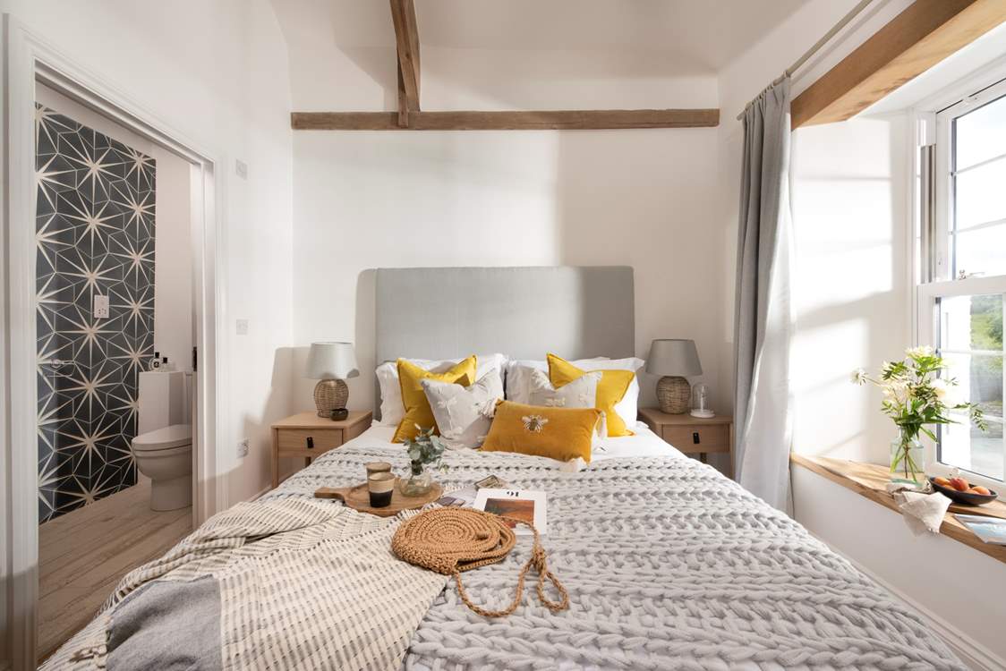 Step inside bedroom 4 to your lovely king-size bed.