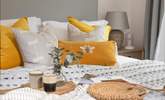 Lovely linens, gorgeous cushions and snug throws. - Thumbnail Image