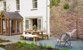 The terrace in the front garden is the perfect spot for dining in the best of the Cornish sunshine. - Thumbnail Image