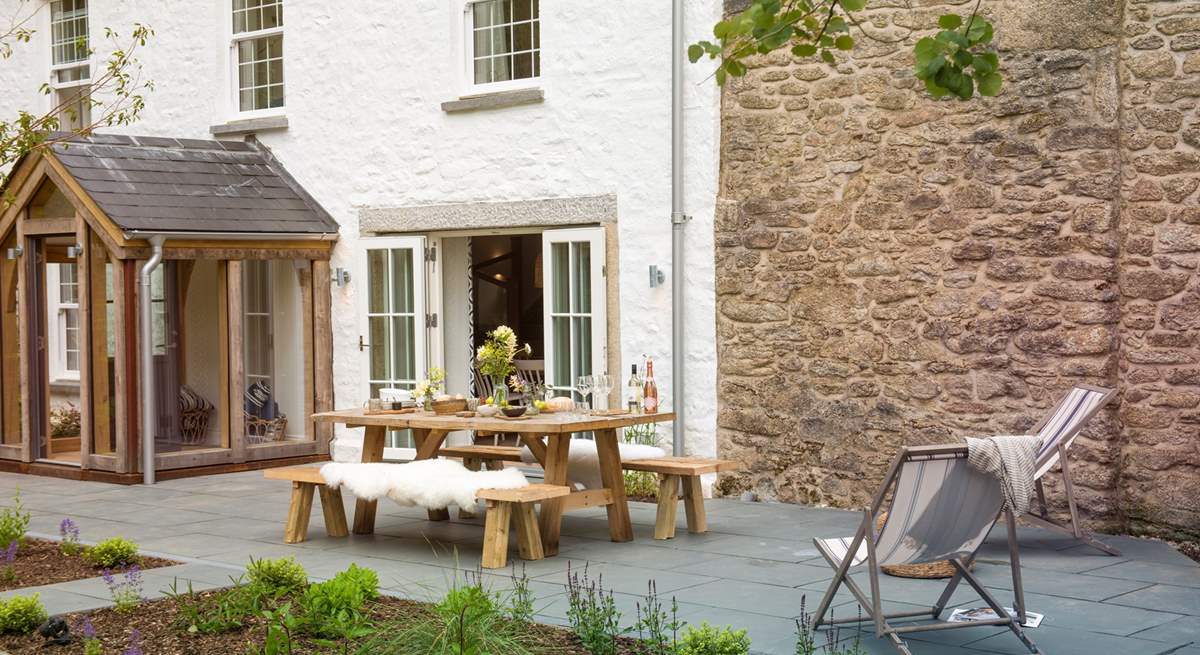 The terrace in the front garden is the perfect spot for dining in the best of the Cornish sunshine.