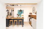 Pull up a pew at the kitchen island to grab a quick bite or perhaps to give the chef one or two tips!
