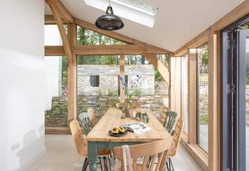 The sunny dining-area to the side of the kitchen is ideal for lazy breakfasts and holiday lunches.