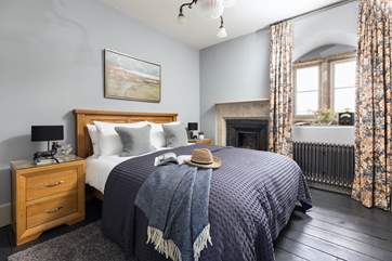Bedroom 1 is elegantly furnished.