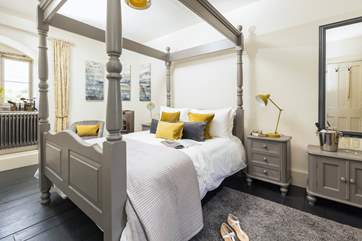 With an elegant four-poster and luxury linens, bedroom 2 awaits.