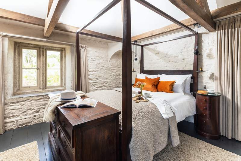 Dreamy oak beamed bedroom 3 with four-poster bed and beautiful furniture.
